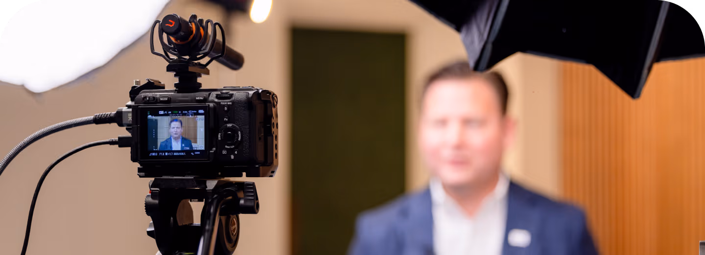 Camera capturing a professional video shoot setup